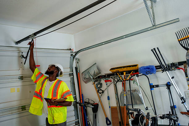 Professional Garage Door Panel Replacement technician working in Syracuse, NY